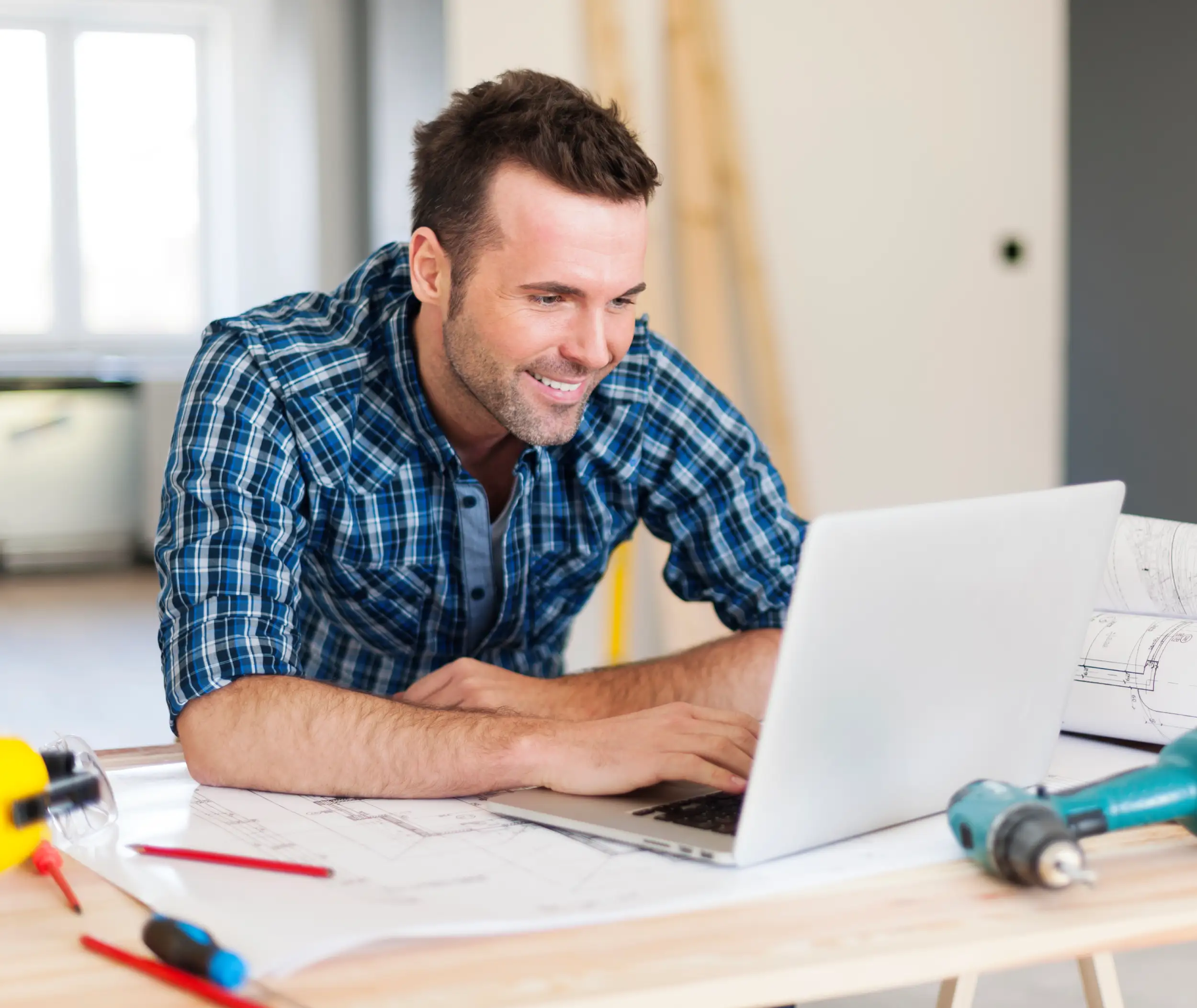 Man working on a laptop at a desk
